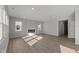 Bright and airy living room featuring lots of natural light and a modern fireplace at 10133 Redwood Peak Ln, Indianapolis, IN 46259