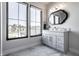 Stylish bathroom with a modern vanity, large windows, and marble flooring at 10937 Pete Dye Rdg, Zionsville, IN 46077