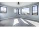 Bright bedroom showcasing large windows for ample natural light at 10937 Pete Dye Rdg, Zionsville, IN 46077