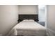 Relaxing bedroom featuring a modern bed frame and plush bedding for a comfortable and inviting space at 10937 Pete Dye Rdg, Zionsville, IN 46077