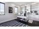 Bright office featuring built-in shelving, a modern desk, and natural light at 10937 Pete Dye Rdg, Zionsville, IN 46077