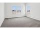 Bedroom features carpet and two windows for ample natural light at 7856 Magnolia St, New Palestine, IN 46163