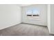Bright bedroom with large window offering a view of a snowy landscape at 7856 Magnolia St, New Palestine, IN 46163