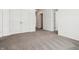 Spacious carpeted bedroom with ample closet space and natural light at 7856 Magnolia St, New Palestine, IN 46163