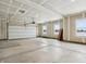 Spacious two car garage with room for storage and an automatic door opener at 7856 Magnolia St, New Palestine, IN 46163