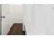 Mudroom features a built-in bench, closet, and wainscotting at 7856 Magnolia St, New Palestine, IN 46163