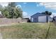 Landscaped backyard with a detached garage at 2161 Napoleon St, Indianapolis, IN 46203