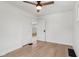 Spacious bedroom with light wood floors and access to another room at 2161 Napoleon St, Indianapolis, IN 46203