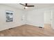 Spacious bedroom with hardwood floors and an interior door at 2161 Napoleon St, Indianapolis, IN 46203