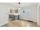 Light-filled dining room adjacent to a modern kitchen at 2161 Napoleon St, Indianapolis, IN 46203