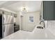 Modern kitchen with stainless steel appliances and white cabinets at 2161 Napoleon St, Indianapolis, IN 46203