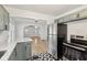 Modern kitchen with stainless steel appliances and a breakfast bar at 2161 Napoleon St, Indianapolis, IN 46203