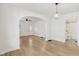 Open living area with hardwood floors and access to other rooms at 2161 Napoleon St, Indianapolis, IN 46203