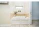 Relaxing bathroom with soaking tub, tile surround, and updated fixtures at 4729 Pearcrest Way, Greenwood, IN 46143