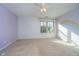 Charming bedroom featuring a rainbow wall and neutral carpet at 4729 Pearcrest Way, Greenwood, IN 46143