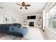 Spacious living room with a fireplace and built-in shelves at 4729 Pearcrest Way, Greenwood, IN 46143