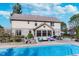 Stunning in-ground pool with patio, screened porch and hot tub at 4729 Pearcrest Way, Greenwood, IN 46143