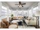 Sunroom with comfortable seating and plenty of natural light at 4729 Pearcrest Way, Greenwood, IN 46143