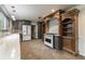 Charming kitchen featuring stainless steel appliances, custom cabinets, and decorative backsplash at 6470 Around The Hills Rd, Indianapolis, IN 46226