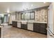 Bright kitchen showcasing a large window, stainless steel appliances, and custom cabinets at 6470 Around The Hills Rd, Indianapolis, IN 46226