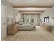 Stylish main bedroom with natural wood accents, soft lighting, and a calming color palette at 1717 Beaufain St, Carmel, IN 46032