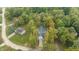 Home surrounded by trees in a quiet neighborhood at 4429 Village Dr, Anderson, IN 46012