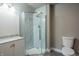 Modern bathroom with a large shower and granite vanity at 4429 Village Dr, Anderson, IN 46012
