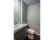 Modern powder room with floating vanity at 4429 Village Dr, Anderson, IN 46012