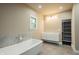 Relaxing bathroom with soaking tub and walk-in shower at 4429 Village Dr, Anderson, IN 46012