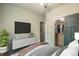 Bedroom with a queen bed, TV, and ample closet space at 4429 Village Dr, Anderson, IN 46012