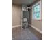 Laundry room with HVAC unit and tile floor at 4429 Village Dr, Anderson, IN 46012