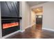 Living room with electric fireplace and dark hardwood floors at 4429 Village Dr, Anderson, IN 46012