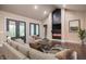 Bright living room with hardwood floors and French doors leading to backyard at 4429 Village Dr, Anderson, IN 46012