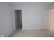 White room with a door in it at 5057 Modernist Blvd, Indianapolis, IN 46237