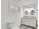 Modern bathroom with double vanity and updated fixtures at 628 N Beville Ave, Indianapolis, IN 46201
