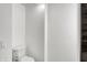 Simple toilet and white walls at 628 N Beville Ave, Indianapolis, IN 46201