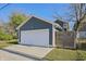 Detached two-car garage with driveway at 628 N Beville Ave, Indianapolis, IN 46201