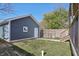 Detached garage with pathway and lawn at 628 N Beville Ave, Indianapolis, IN 46201
