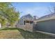 House exterior showcasing modern fence and lawn at 628 N Beville Ave, Indianapolis, IN 46201