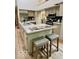 Spacious kitchen featuring stainless appliances, ample counter space and island seating at 6438 Pin Oak Dr, McCordsville, IN 46055