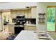 Well-equipped kitchen with modern appliances, ample counter space and natural light at 6438 Pin Oak Dr, McCordsville, IN 46055
