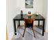 Simple office space featuring a black desk, chair, and carpeted floors at 6438 Pin Oak Dr, McCordsville, IN 46055
