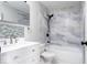 Beautiful bathroom featuring new tiling in the shower and updated vanity at 6072 Wingedfoot Ct, Indianapolis, IN 46254