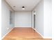 Cozy dining area with hardwood floors and a window, conveniently near the kitchen at 6072 Wingedfoot Ct, Indianapolis, IN 46254