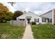 Charming home with a well-maintained lawn, sidewalk and privacy fence at 6072 Wingedfoot Ct, Indianapolis, IN 46254