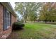 Beautiful home with a large front lawn and mature trees at 6072 Wingedfoot Ct, Indianapolis, IN 46254