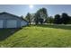 Spacious yard with a detached garage, perfect for outdoor activities at 3231 W State Road 32, Westfield, IN 46074