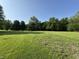 Expansive grassy yard, offering ample space for recreation and relaxation at 3231 W State Road 32, Westfield, IN 46074