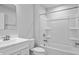 Clean bathroom with white vanity, bathtub, and shower at 420 Charles Freer Ln, Whiteland, IN 46184