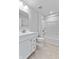 Bathroom with white vanity, tub, shower, and tile floor at 420 Charles Freer Ln, Whiteland, IN 46184
